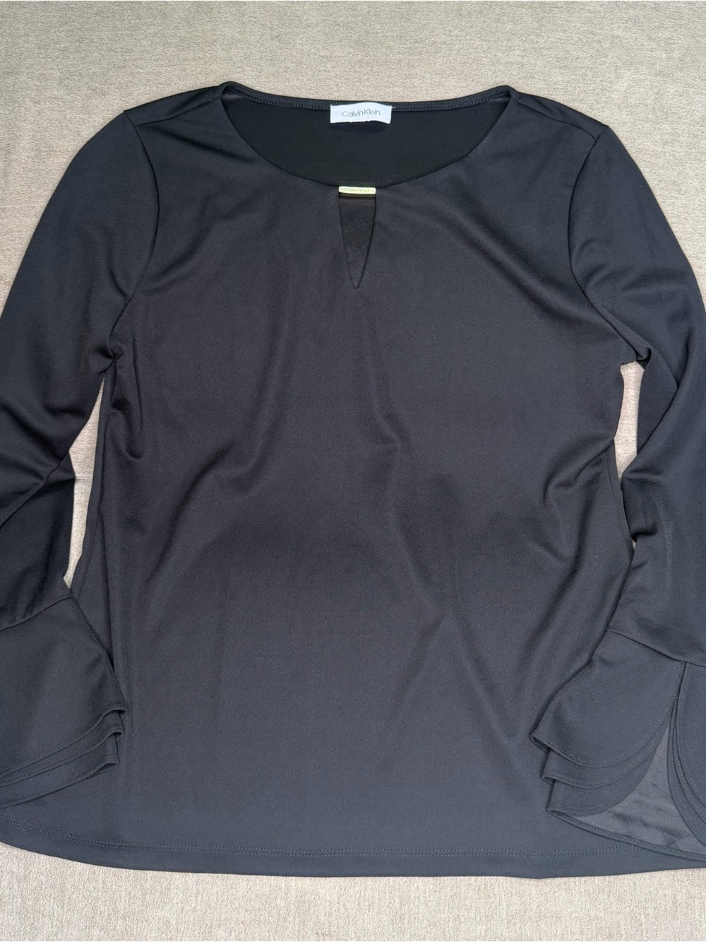 Calvin Klein Black Long-Sleeve Keyhole Top with Gold Bar